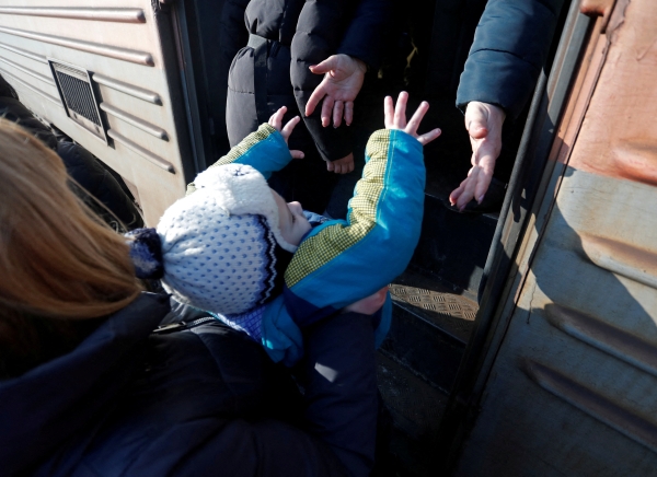 Ukrainian families forced to flee